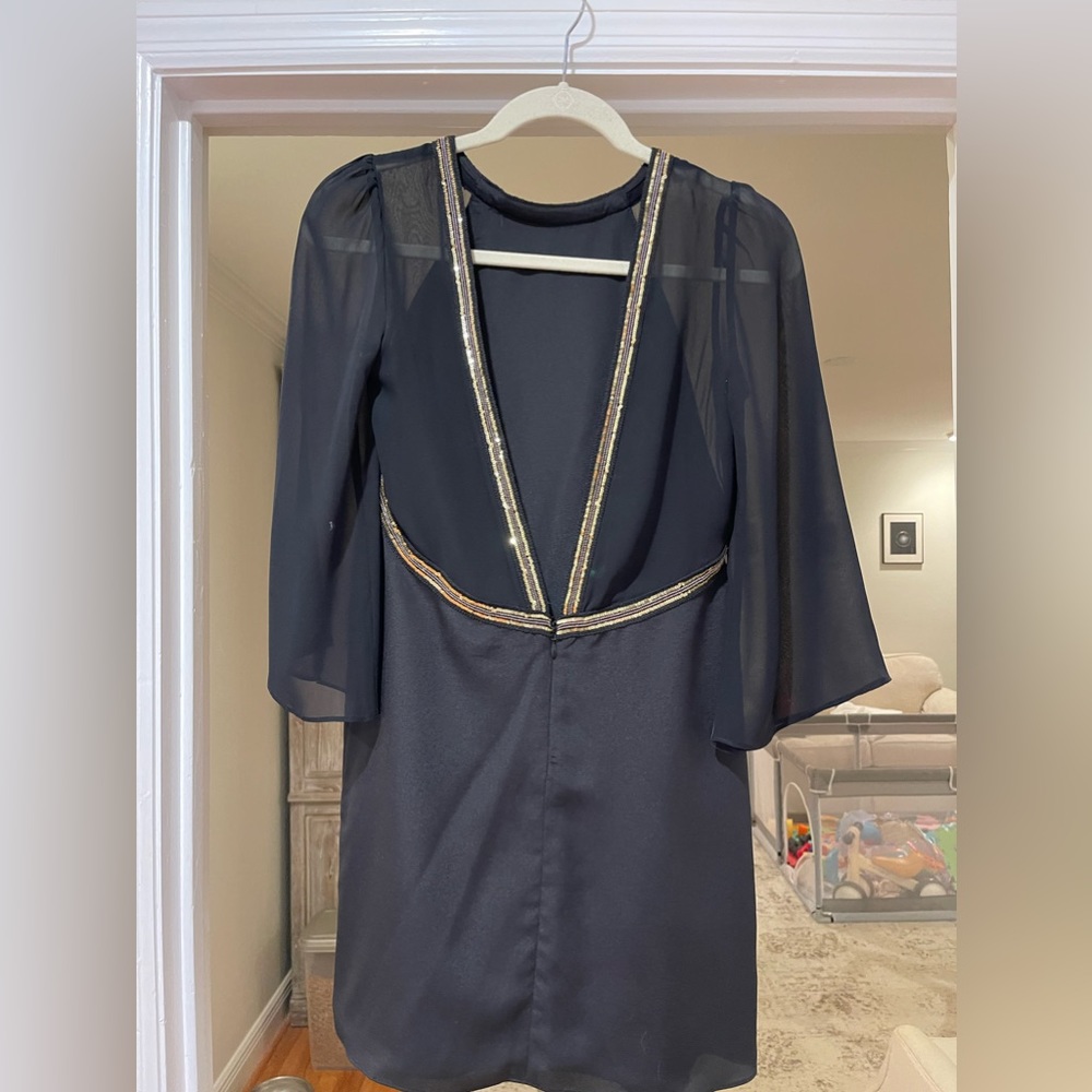 BCBGeneration mini black dress with gold sequin detailing. Open back. Size 2